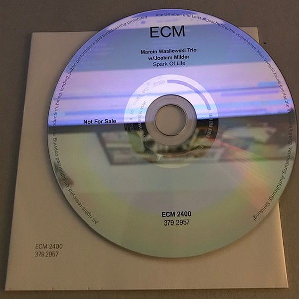 https://www.discogs.com/release/18019018-Marcin-Wasilewski-Trio-W-Joakim-Milder-Spark-Of-Life